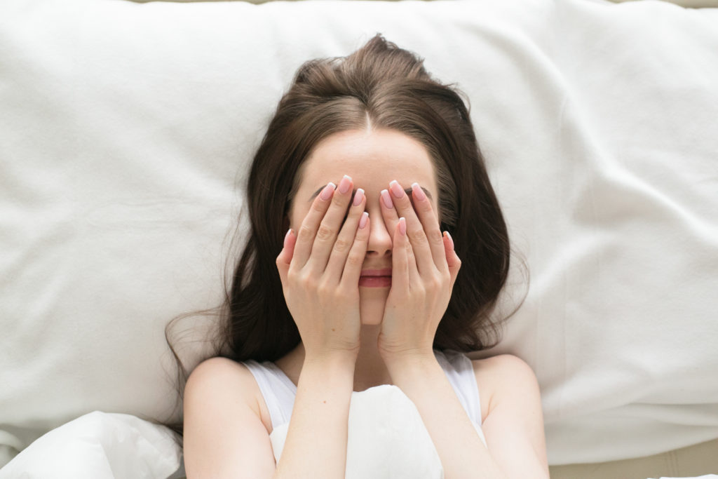 Woman in bed sleeping relax alone at home bed sleep